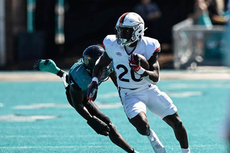 Xavier Brown leads way with 171 yards, Virginia runs over Coastal Carolina in 43-24 win